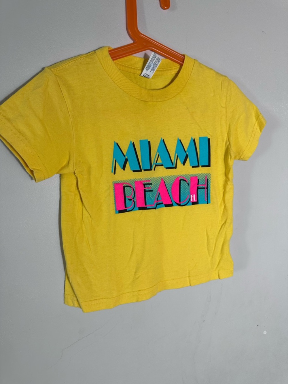 Rabbit Skins Yellow 'Miami Beach' Graphic Tee with Teal and Pink Print